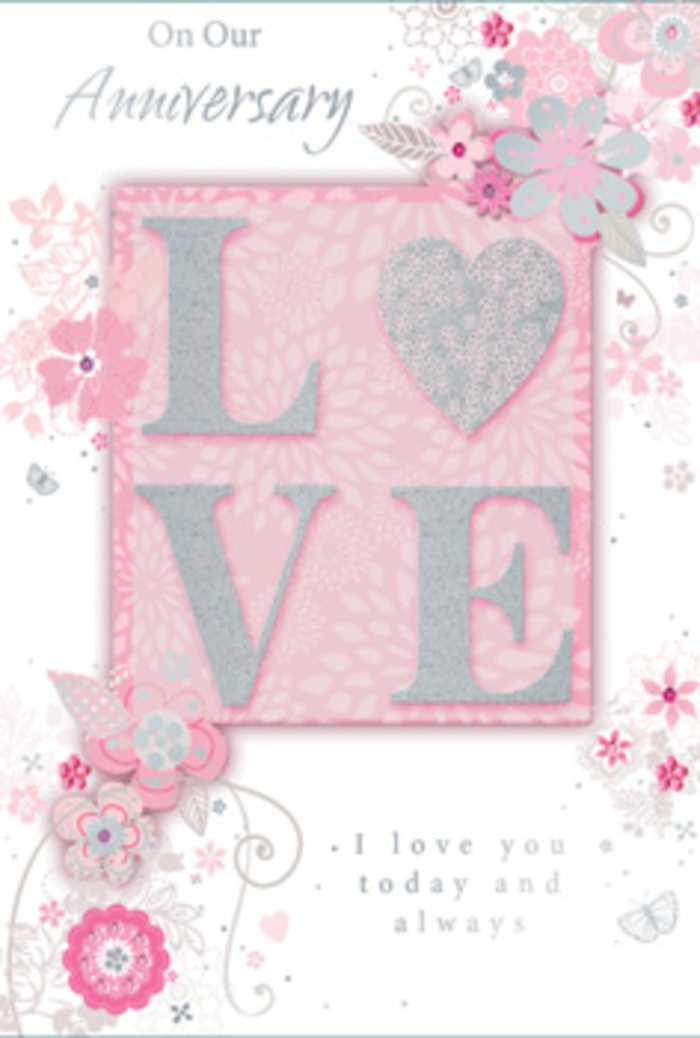 This anniversary card is presented like a delicate work of art, its palette of blush, pearlescent white, and soft grey mirroring the gentle romance of an intimate dinner in Watford's quieter neighbourhoods. In the centre, the word LOVE is displayed in large, uppercase letters, raised from the surface and coated with an even dusting of glitter that blends rosy pink and shimmering white tones. Under the hand, the lettering feels textured and slightly grainy, giving the impression of thoughtful craftsmanship rather than mass production. Around this central word, a lace-like frame of stylised flowers, curling tendrils, and small, graceful leaves spreads across a background of powdery pink. The florals are drawn with thin, controlled lines in grey and pale silver, their petals filled with soft washes of blush, mauve, and ivory, just as a florist might lightly sketch and shade blooms when planning a new anniversary collection. The spacing between flowers is generous, creating a light, airy effect, with each blossom and vine given room to stand out. Small accents of glitter highlight the curves of certain petals and the arcs of swirling lines, catching ambient light in a series of gentle, glinting points that suggest flickering candlelight on an anniversary table. Interwoven with the floral frame is an elegant script message, its letters flowing smoothly and conveying sentiments of appreciation, devotion, and continued companionship. The script's cool grey tone harmonises with the florals, ensuring that nothing feels too bold or jarring. Overall, the card exudes a sense of quiet celebration and enduring affection, much like a thoughtfully arranged bouquet ready for delivery to a doorstep near Watford's bustling centre or a cosy home on a side street off St Albans Road.